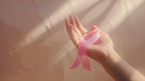 hand-holding-pink-ribbon.jpg hand-holding-pink-ribbon.jpg
